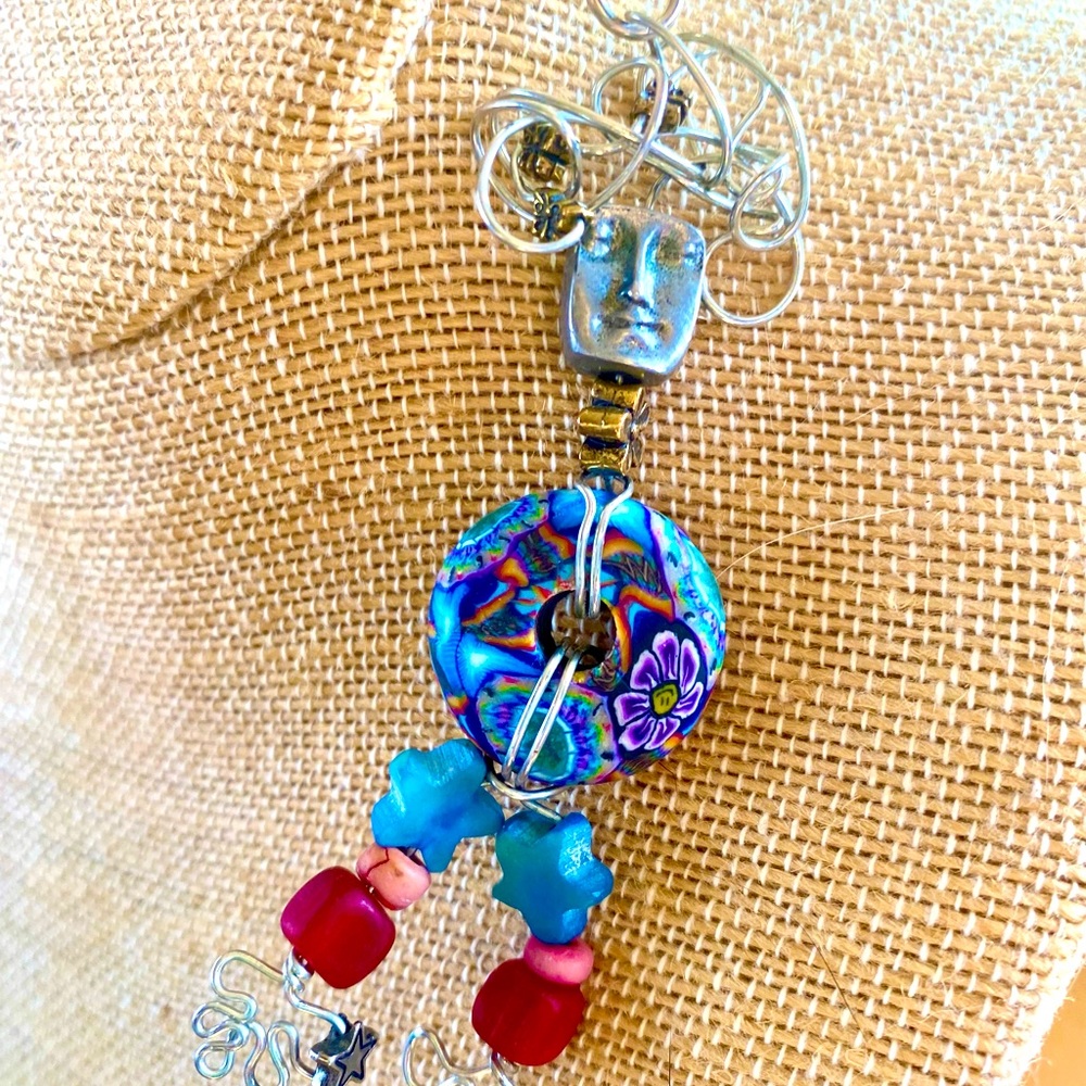 Wire wrapped “Dude”with fimo bead